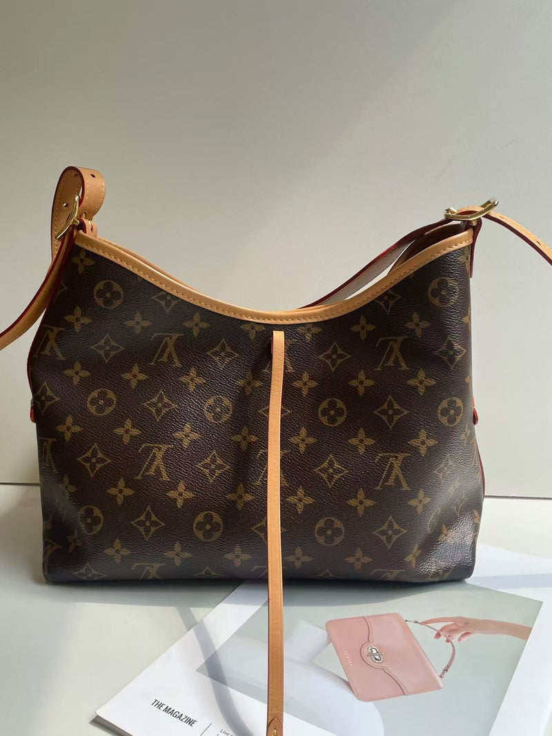 Louis Vuitton CarryAll Small in Monogram Canvas with Vachetta Leather Trim
