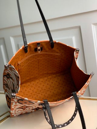 Pre-Loved Louis Vuitton Crafty Onthego GM Caramel/Cream