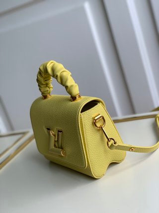 Pre-Loved LV  Twist PM Ginger Yellow